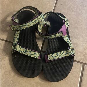 Teva Women's 7 Black Sandals with Yellow-Green Pattern and Purple Accents